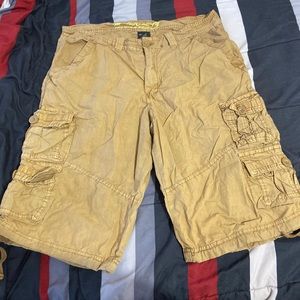 Khaki cargo shorts and navy dress shorts